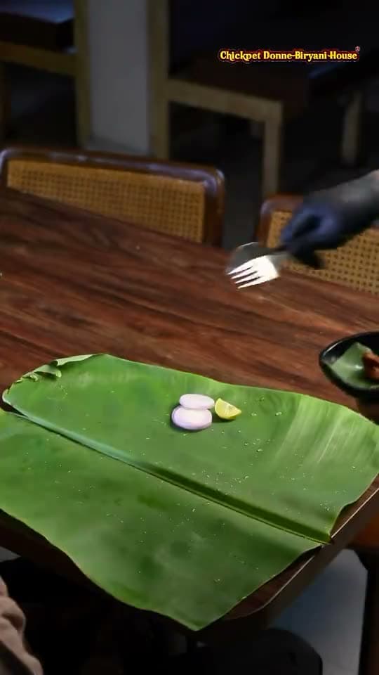 A banana leaf meal being served at Chickpet Donne Biryani House
